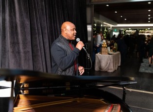 XRonnie and Karen Lott All Stars Helping Kids Holiday Event (2022)