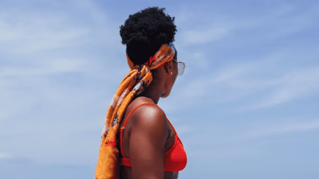 The Best Vacation Hairstyles For Black Women, According To Travel Influencers