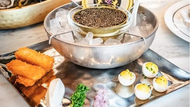 This Luxe Downtown Destination Features Tableside Champagne, Martini Carts, and Caviar Bumps