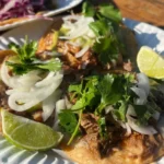 DOS-RAICEZ_CARNITAS-QUESABIRRIA-TACO