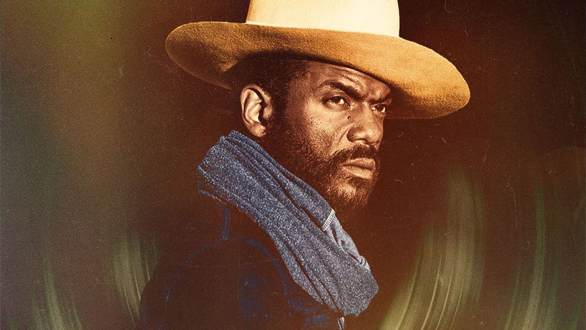 Gary Clark Jr. in a wide-brimmed hat