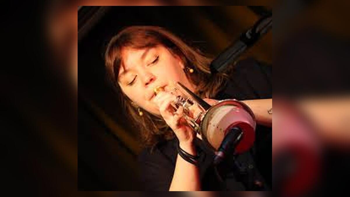 Alexandra Ridout holding a trumpet
