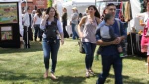 Visitors browse artist booths at Paso Robles Art in the Park