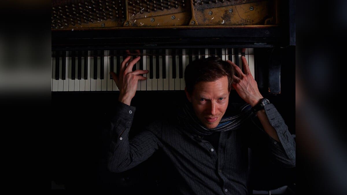 Alon Nechustan at a piano
