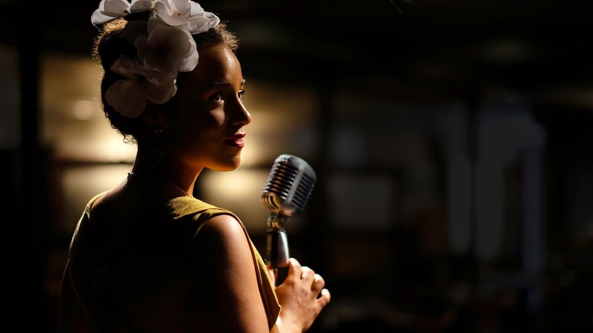 Stella Heath holding a microphone