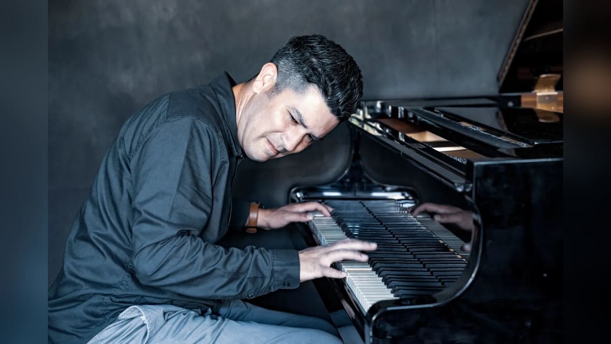 Dahveed Behroozi playing piano