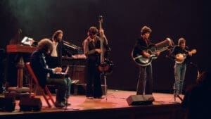The Band performs onstage during the 1976 farewell concert filmed for The Last Waltz.