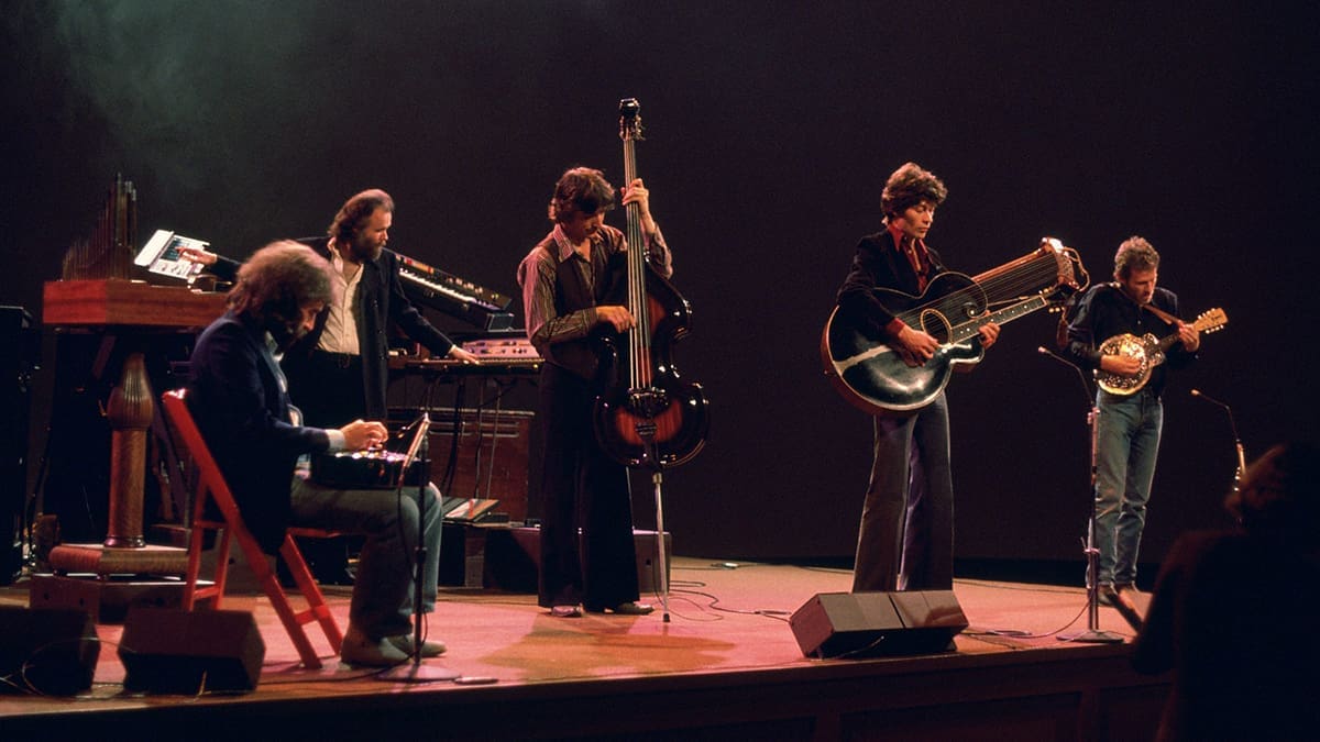 The Band performs onstage during the 1976 farewell concert filmed for The Last Waltz.