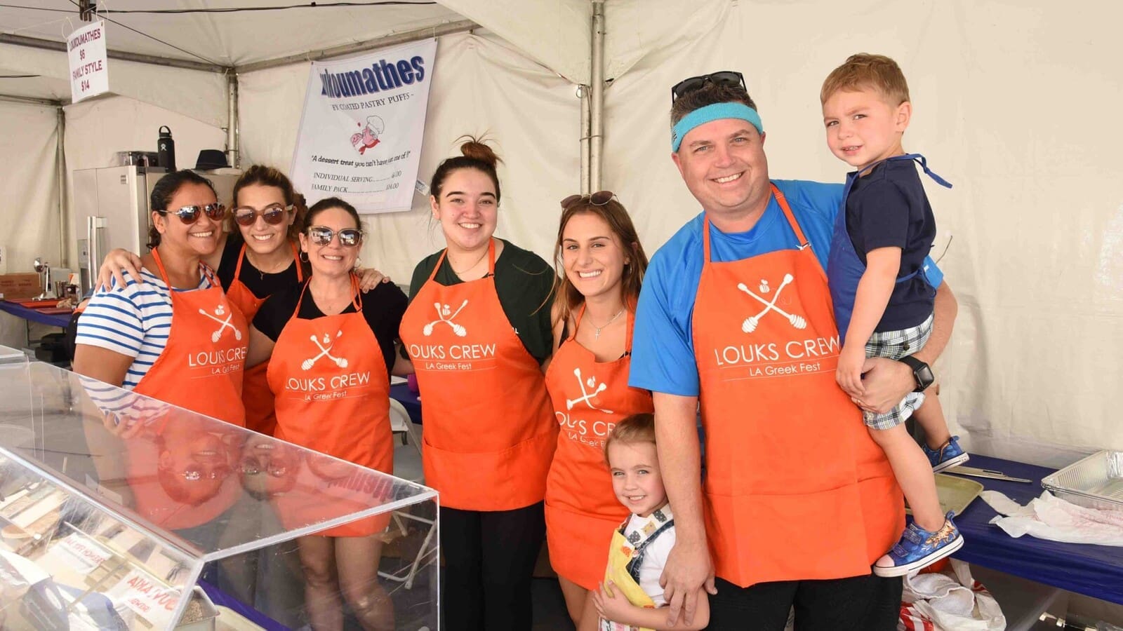 Los Angeles Greek Fest volunteers at the loukoumades booth