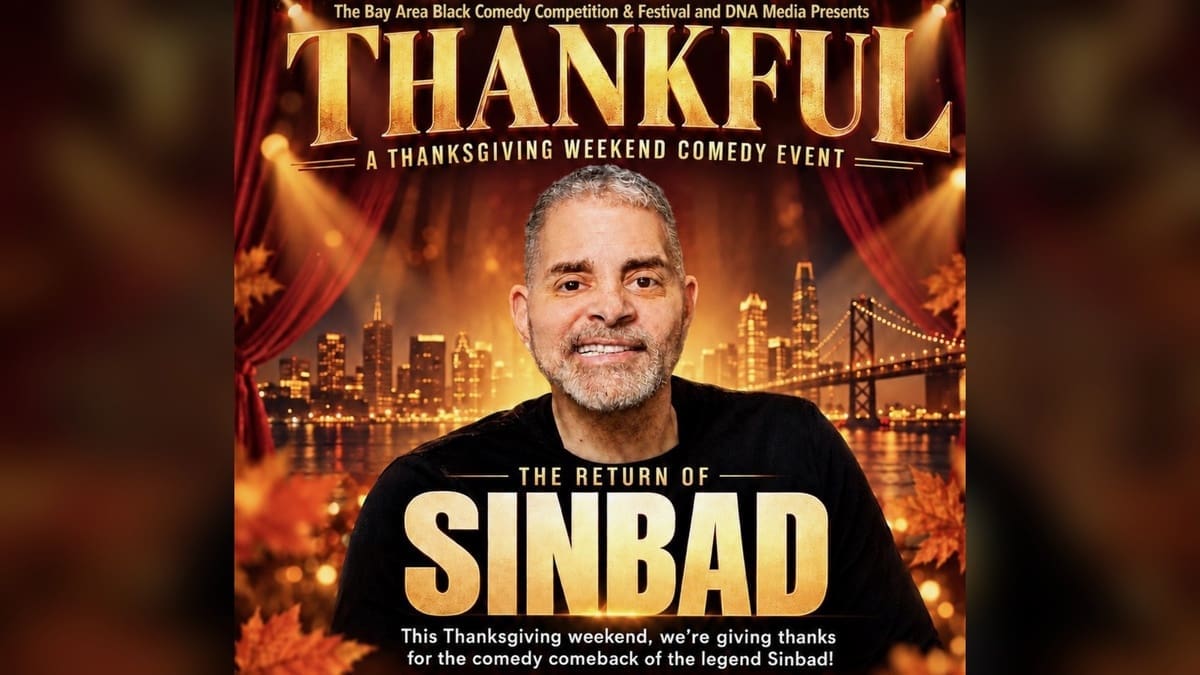 Sinbad smiling beneath Thankful concert lettering.