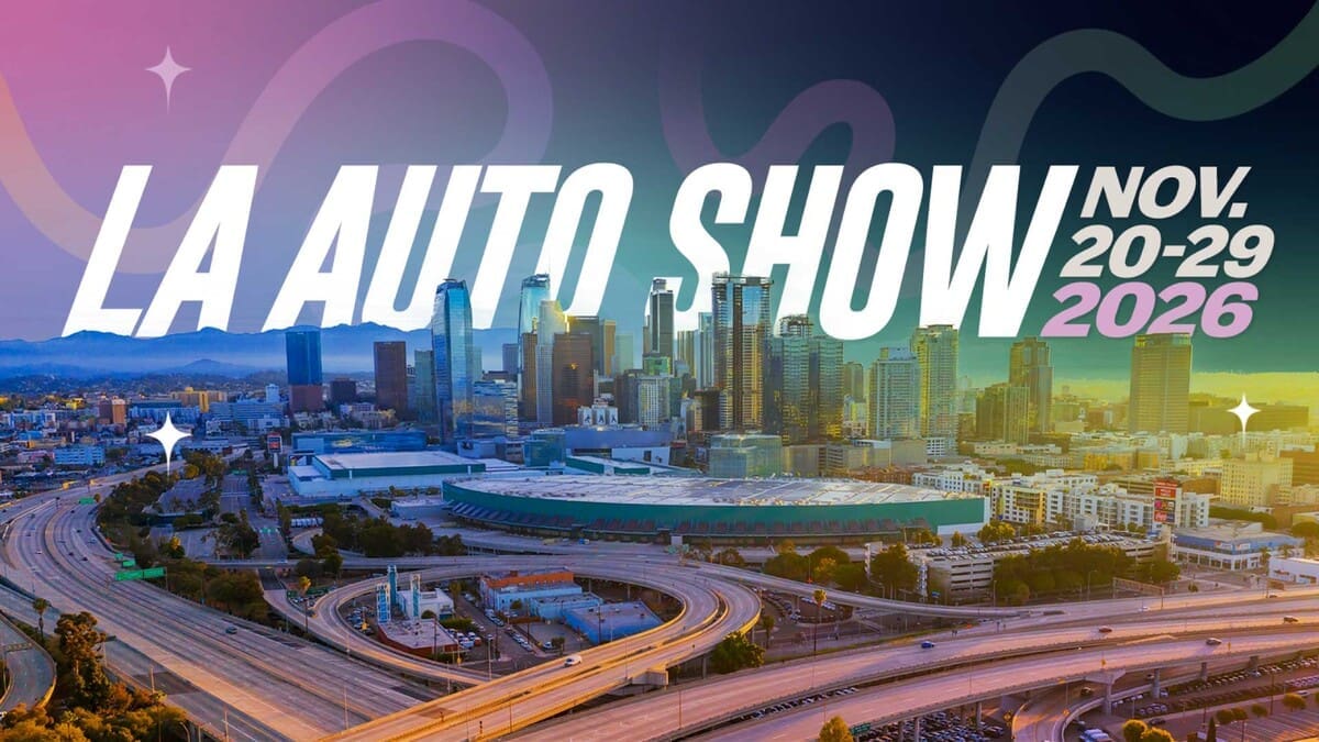 Los Angeles Auto Show banner announcing November 20–29, 2026 above the convention center and Los Angeles skyline